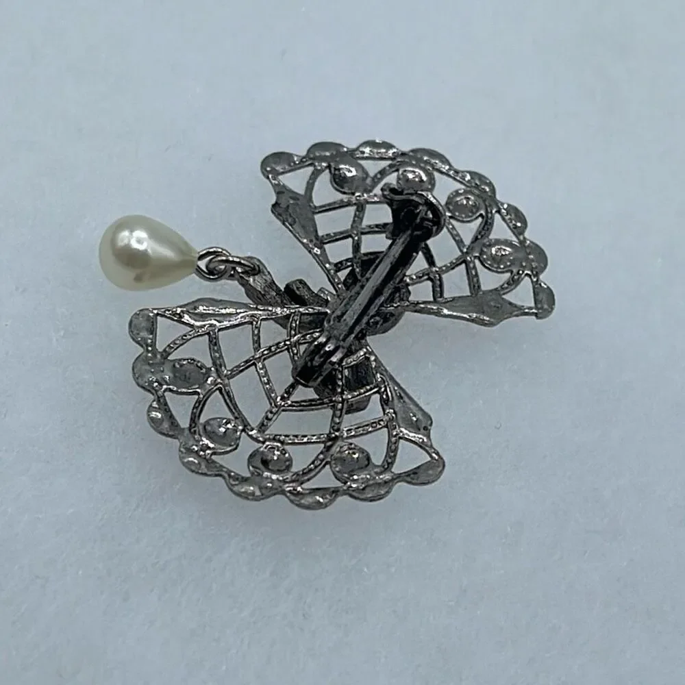 Vintage Bow & rhinestone ribbon with dangle faux pearl.